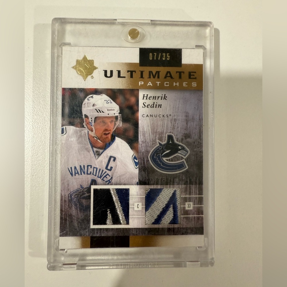 11-12UD Upper Deck Ultimate Patches Henrik Sedin  7 of 35 Dual Patches